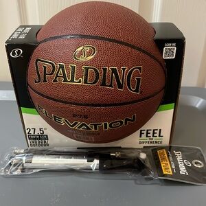 Youth basketball and ball pump